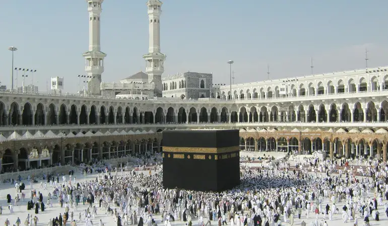 A pilgrim making dua in Masjid al-Haram during prayer